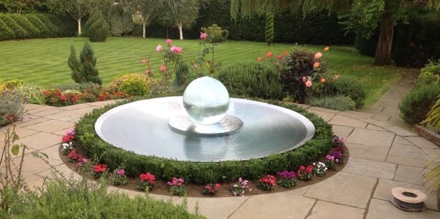 Aqualens Sphere Fountain in Harrow, London Garden